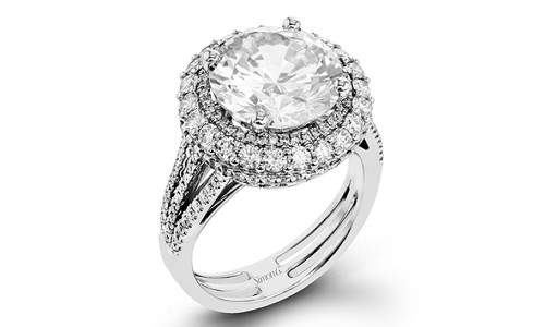 Engagement ring by Simon G. from the Vintage Explorer collection, featuring diamonds, a halo, and split shanks